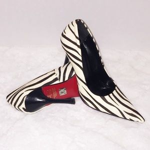Zebra print heels size (6.5)